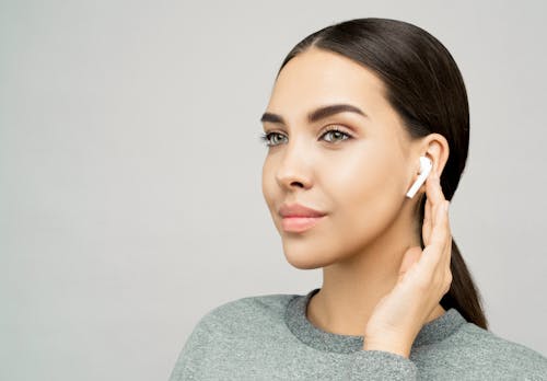 Free Photo Of Woman Touching Her Ear Stock Photo