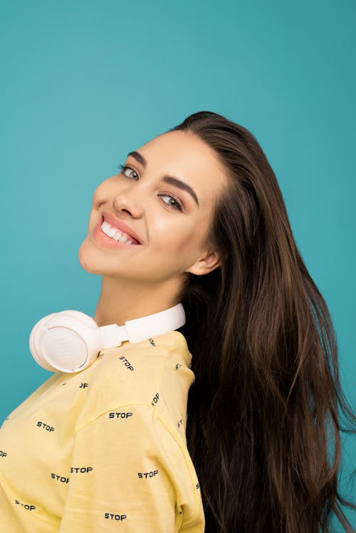 Photo Of Woman Wearing Headphones