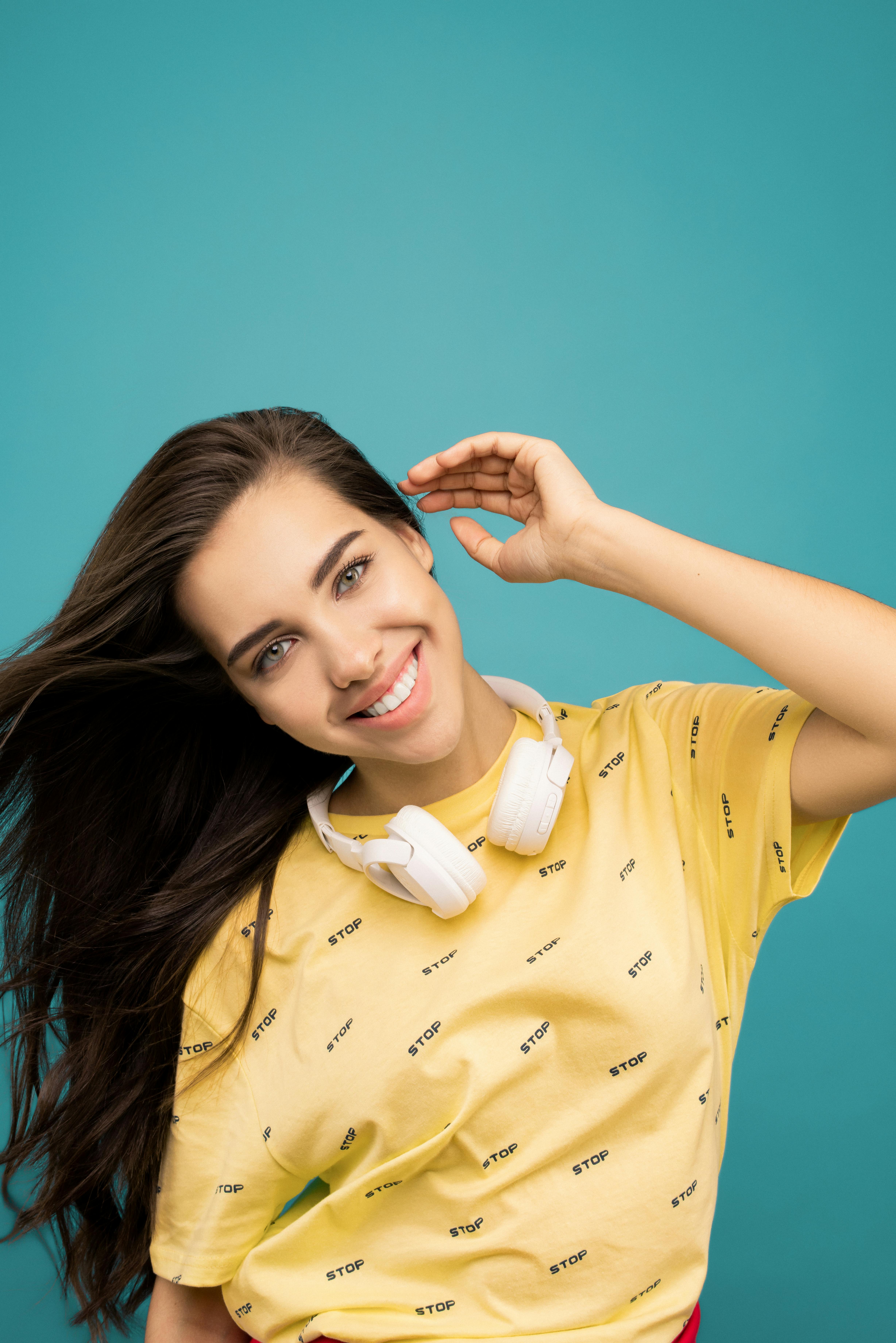 Photo Of Woman Wearing Yellow Shirt · Free Stock Photo