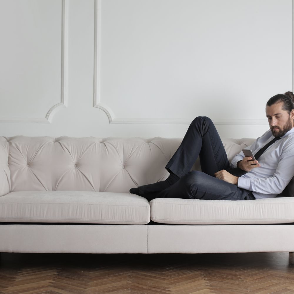 Bugle — movers delivering furniture from a van