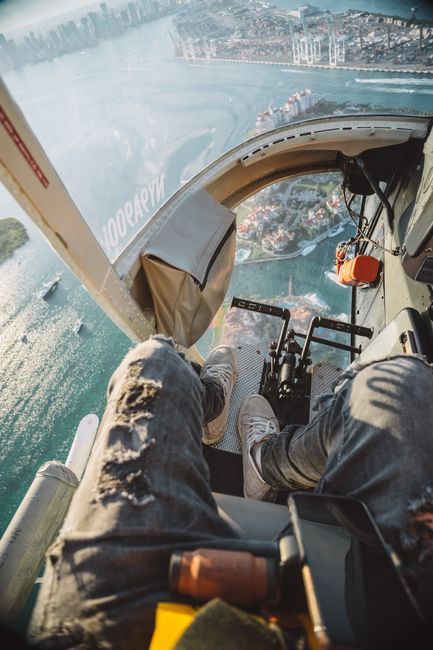Experience the thrill of a helicopter flight with stunning aerial views of Miami's skyline and ocean.