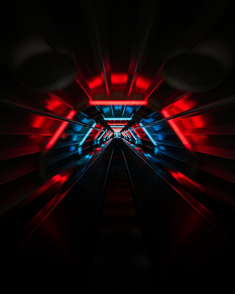 Dark Urban Tunnel With Red And Blue Neon Lights