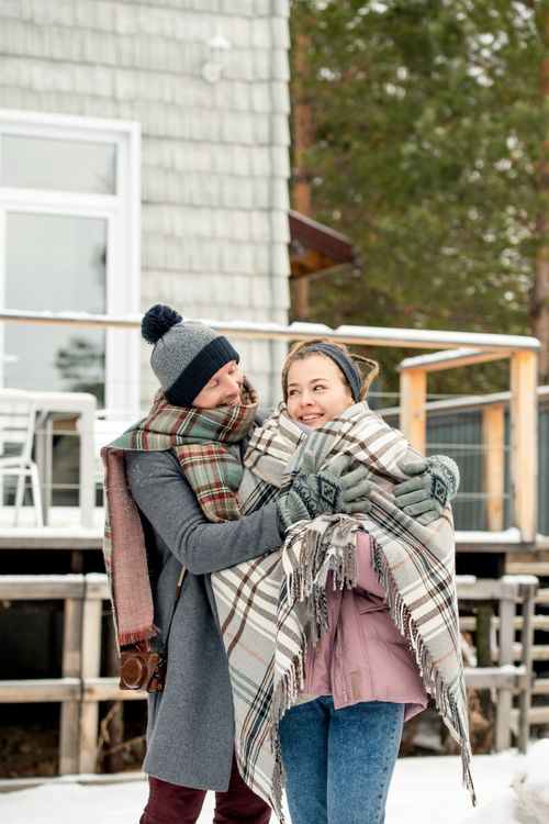 Hugging Coat Man In Gray Coat Hugging Woman Wearing Pink Jacket · Free Stock Photo