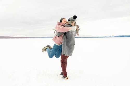 Free Man Carrying Woman Stock Photo