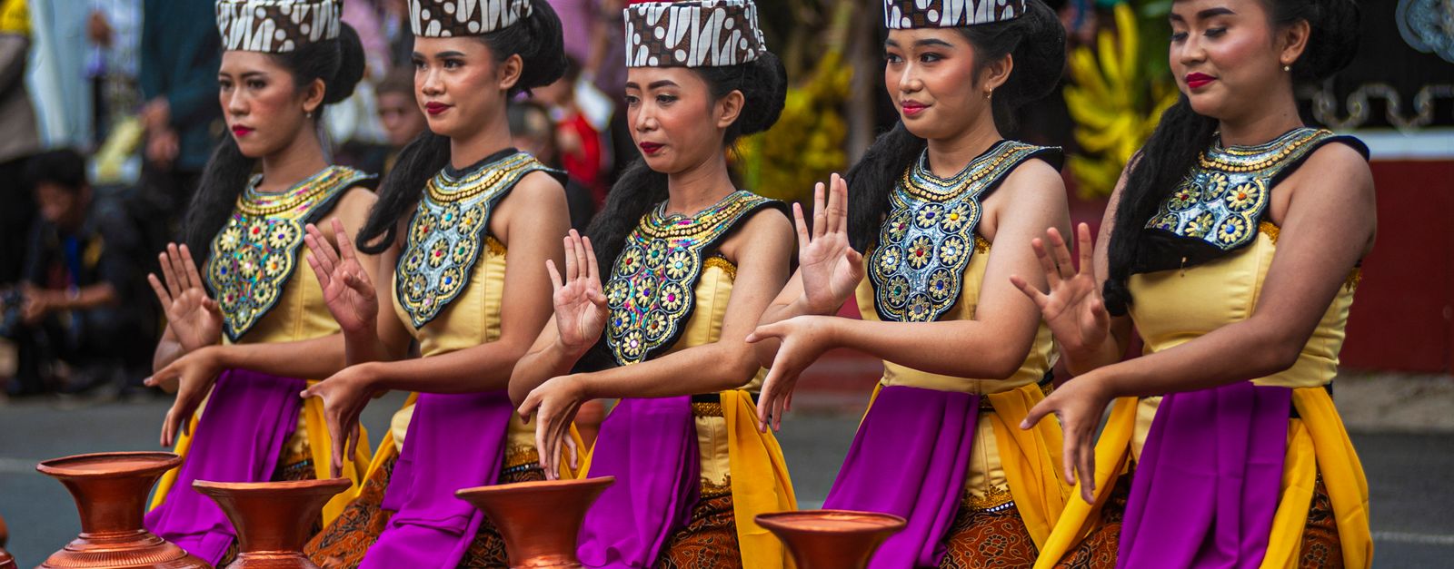 Colorful traditional dance performance in Kuningan, West Java showcasing vibrant costumes and cultural heritage.