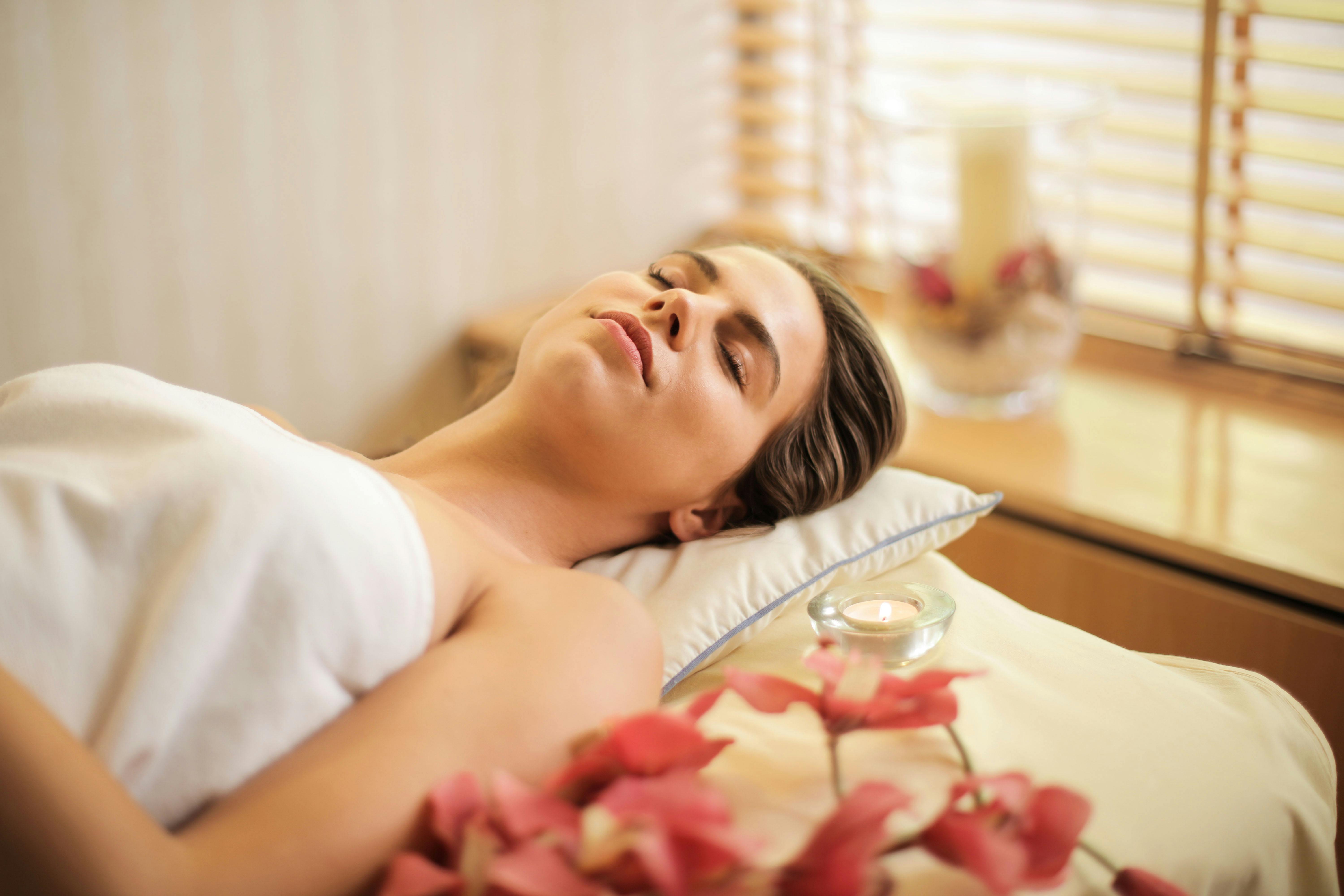 Woman receiving floral massage