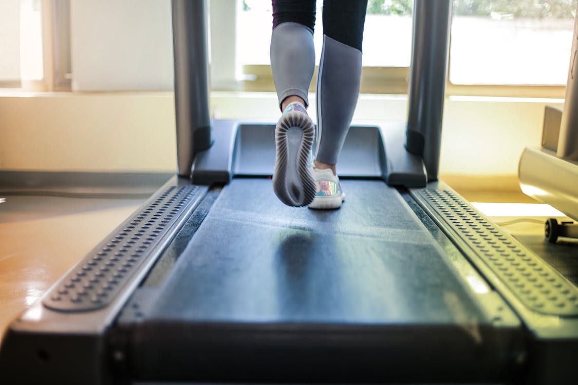 Photo Of Person Using Treadmill