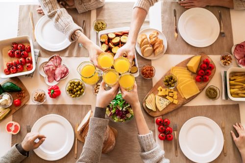 Free A colorful brunch with a variety of dishes and juice toasts, ideal for gatherings. Stock Photo