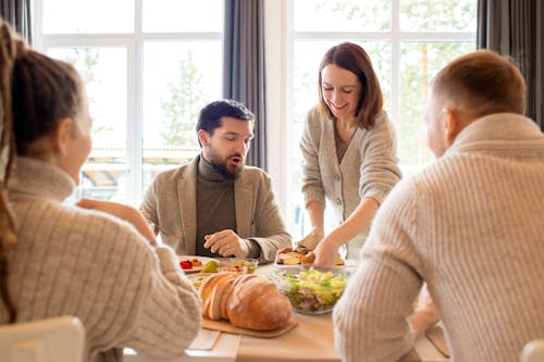 Photo Of Woman Wearing Grey Sweater