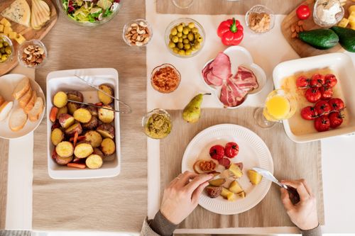 Free A top view of a dining table with diverse foods, showcasing a delicious and colorful meal setup. Stock Photo