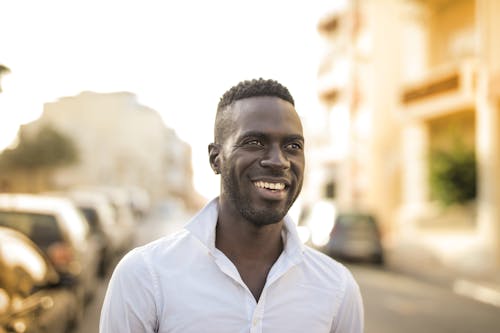 Man in White Button shirt Smiling