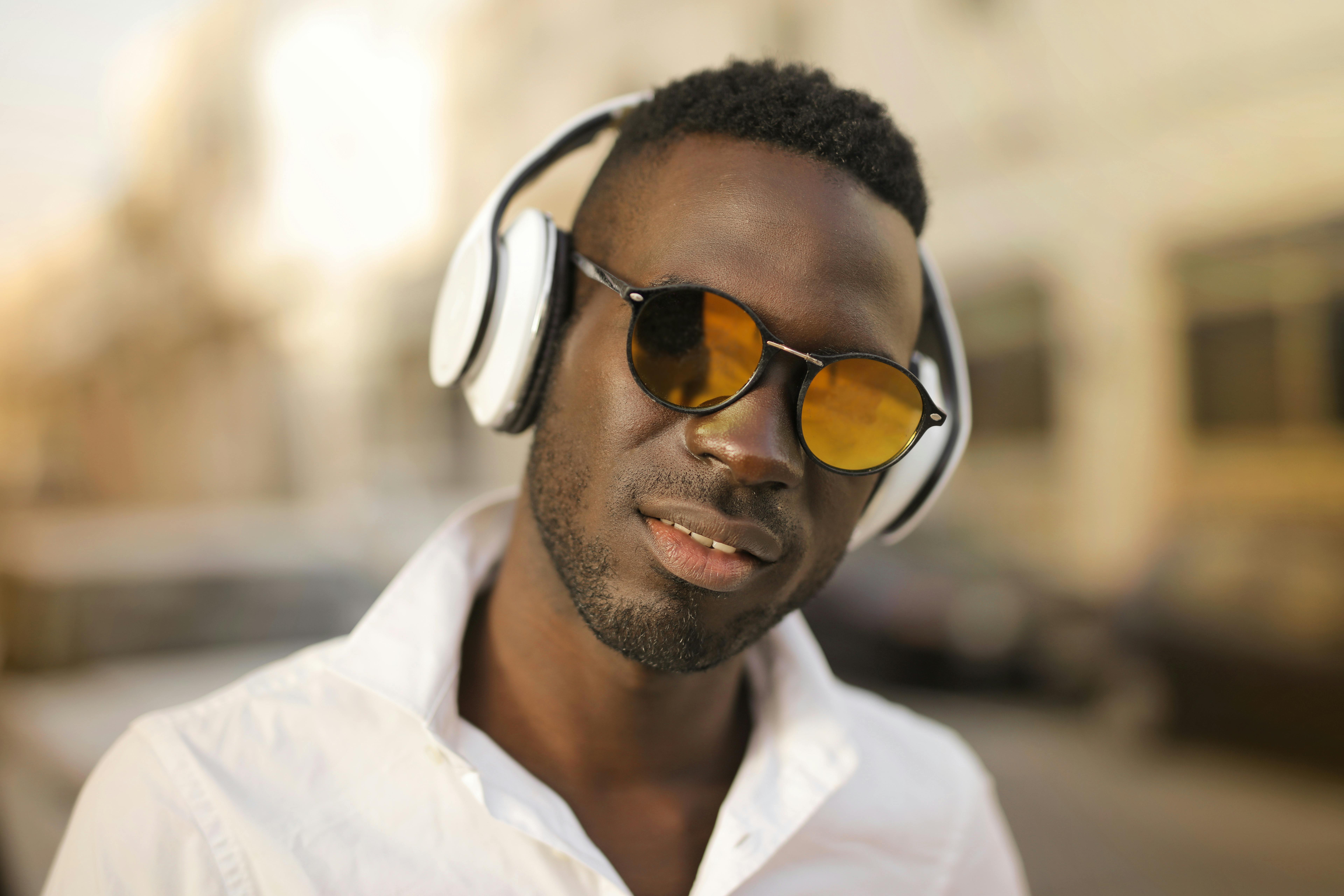 A Man in Sunglasses Wearing Lakers Jersey · Free Stock Photo