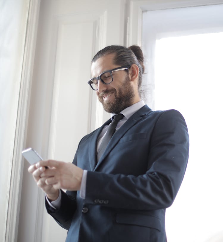 Bearded Man In Blue Suit Received A Good News