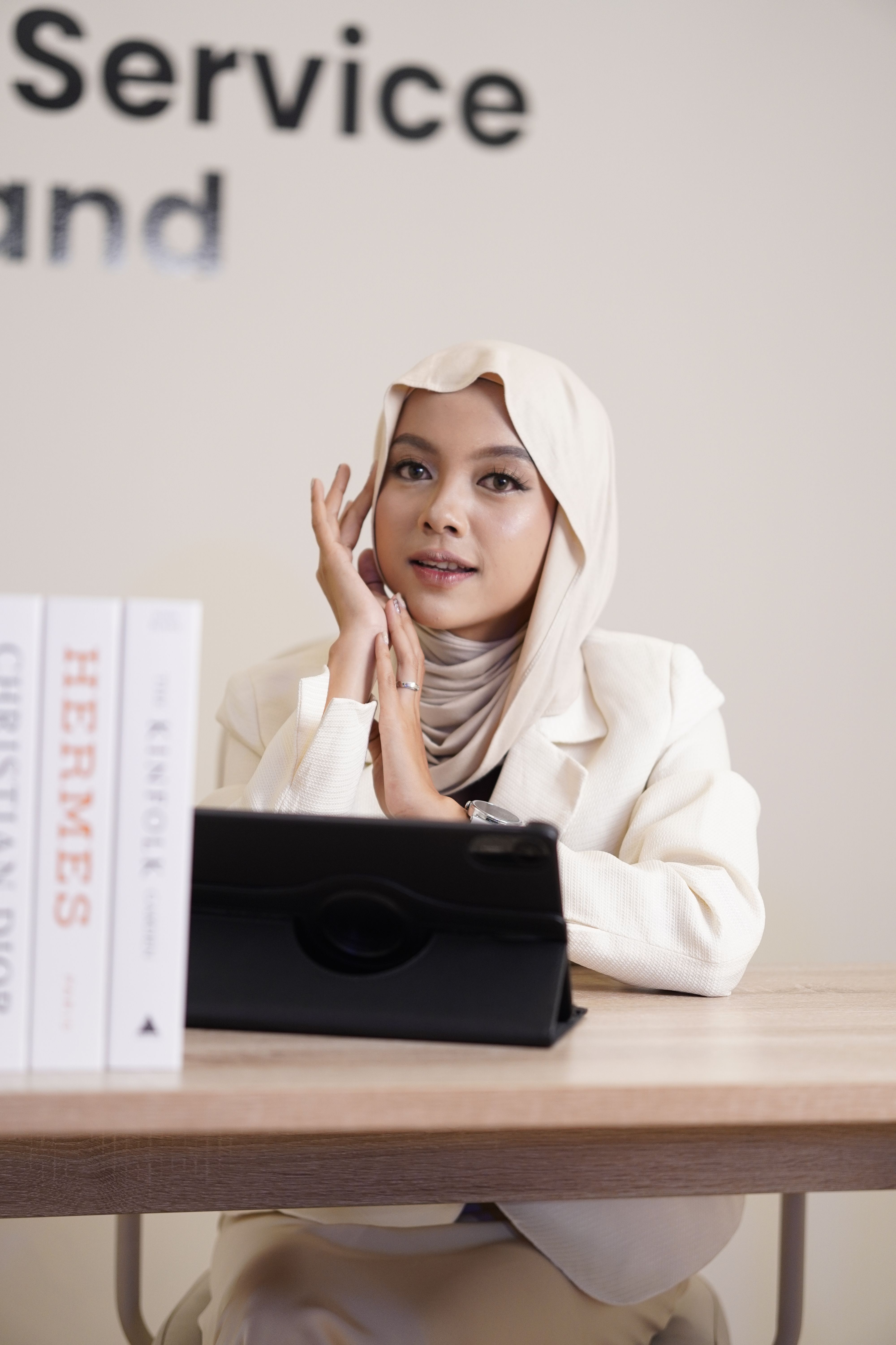 Professional Woman with Hijab at Work Desk