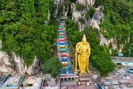 Gold Buddha Statue on River