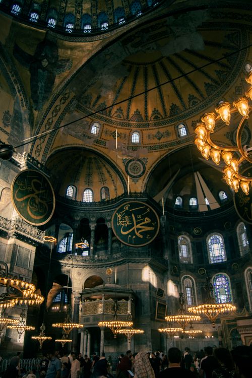 Free Stunning view of Hagia Sophia's grand interior showcasing its iconic domes and chandeliers. Stock Photo