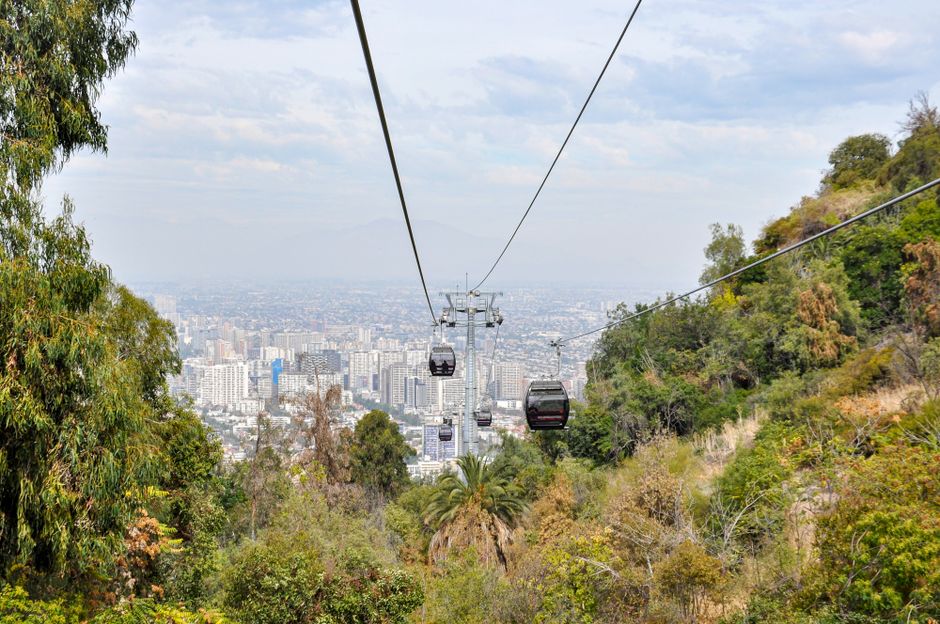 Cable car ascending Table Mountain in Cape Town, South Africa, with city views