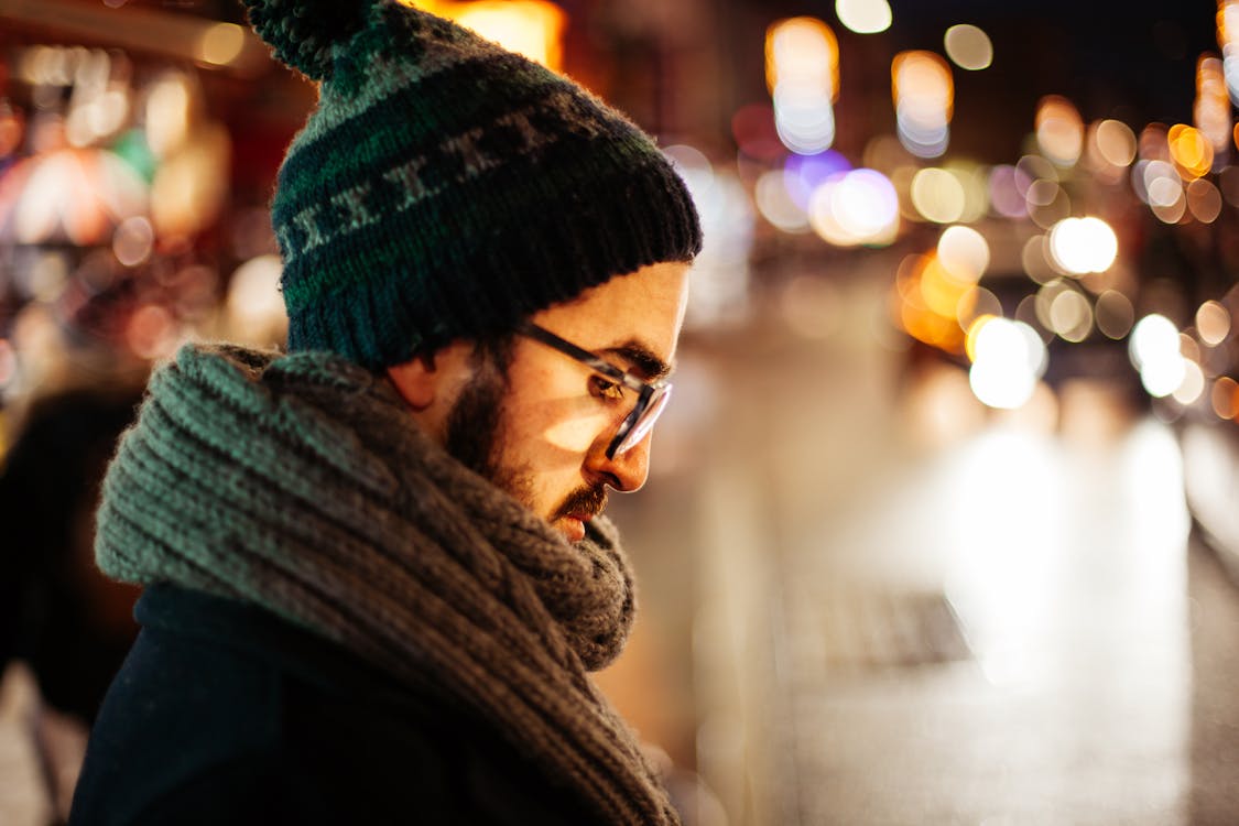 Man Wearing Black Knit Hat