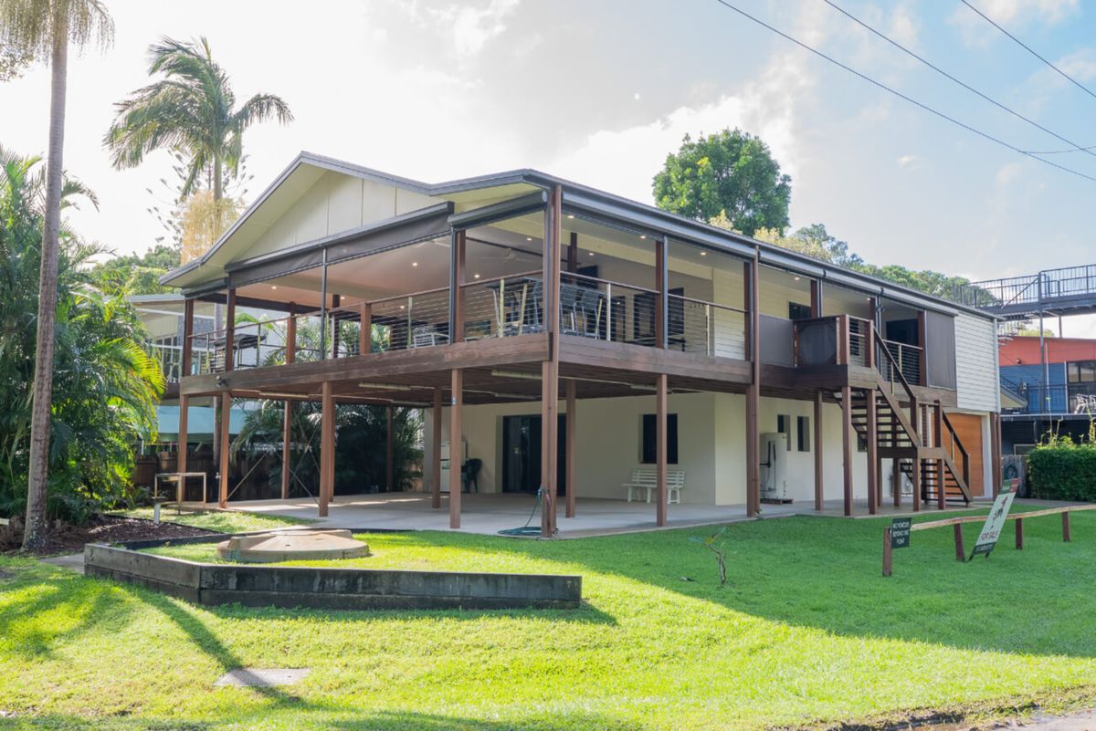 Modern home with a wooden deck and outdoor living space