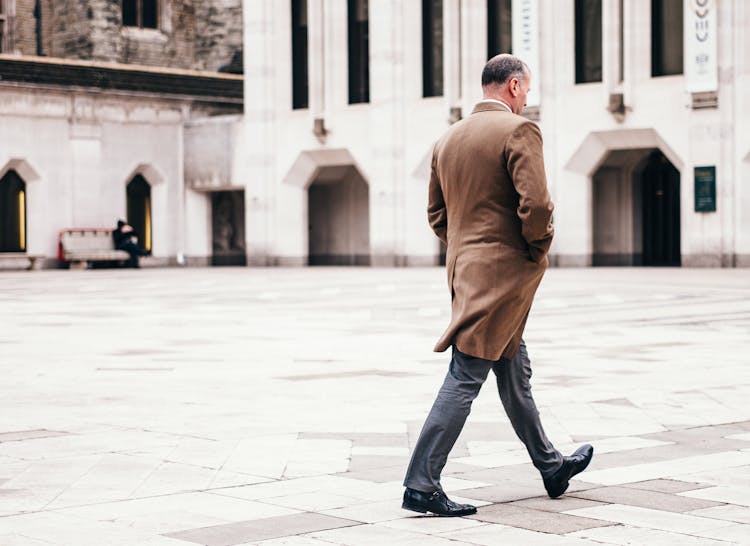 Man Walking Near Building