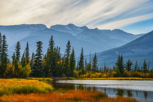 Free Explore the serene beauty of Jasper National Park with colorful autumn foliage and mountain vistas. Stock Photo
