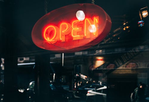 Low Light Photography of Open Neon Sign