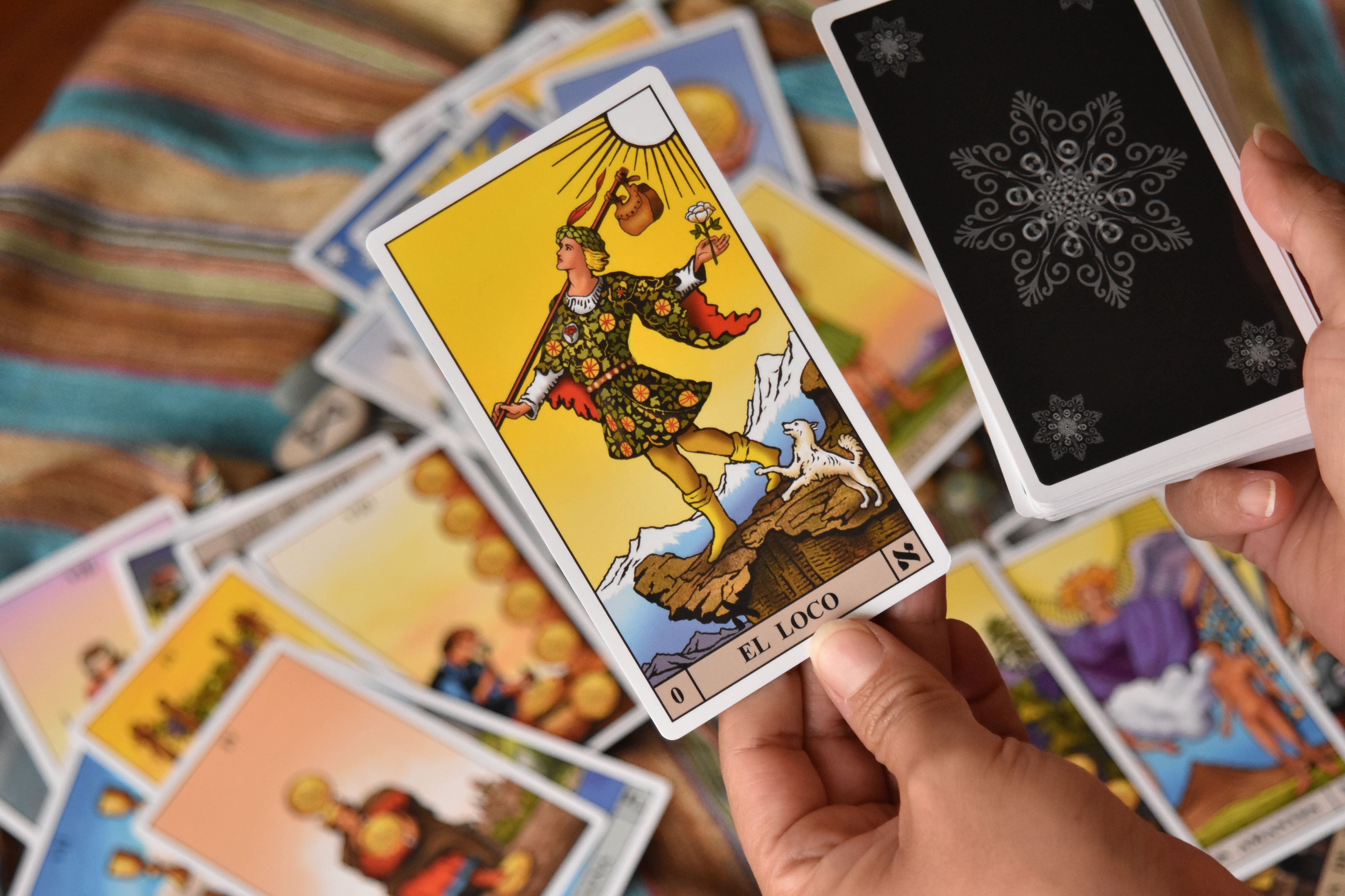 Examples of Minor Arcana cards from the Marseille tarot, such as Eight of Swords and Two of Cups, showing only repeated patterns of swords and cups without human figures
