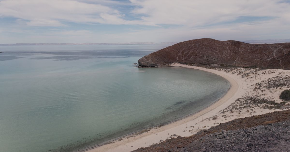 A stunning view of a tranquil beach cove in Cabo San Lucas, Baja California Sur, Mexico.