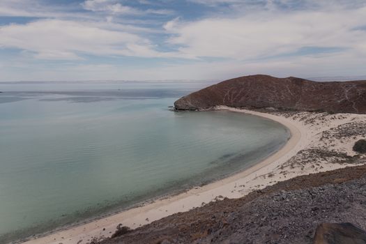 A stunning view of a tranquil beach cove in Cabo San Lucas, Baja California Sur, Mexico.