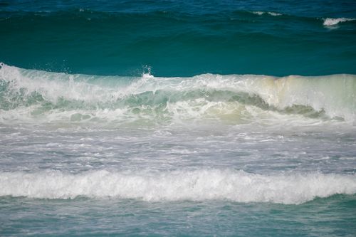 Free Dynamic ocean waves crashing in the Caribbean sea at Cancún, Quintana Roo, Mexico, showcasing natural beauty. Stock Photo