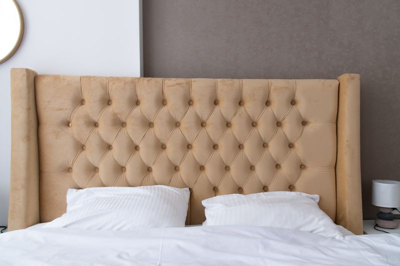 Quiet luxury bedroom with linen upholstery in Miami