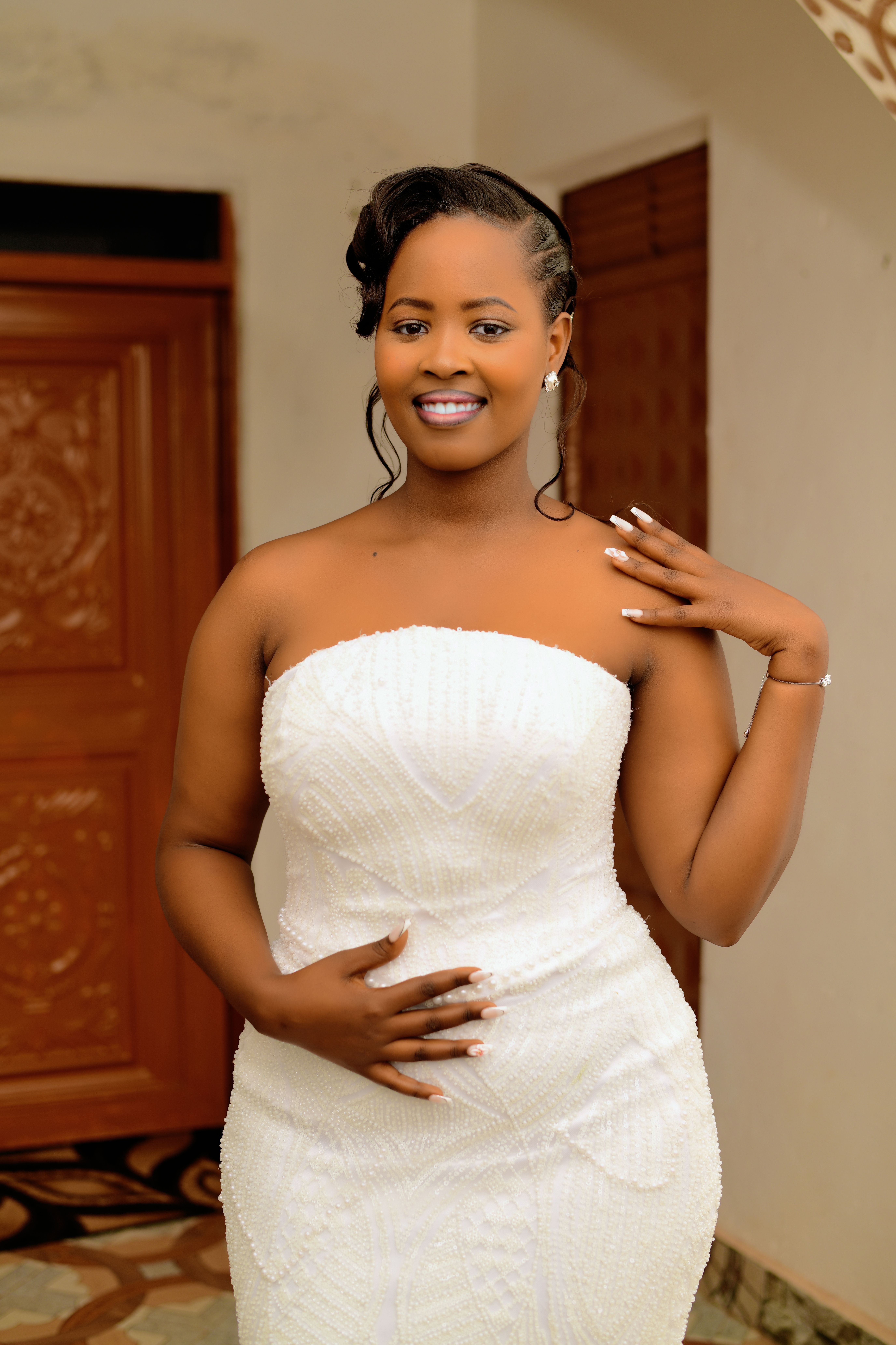 Bride Smiling in Elegant White Wedding Dress · Free Stock Photo