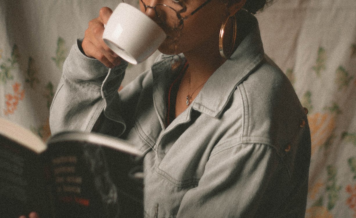 Free Woman Drinking Coffee in White Ceramic Mug Stock Photo