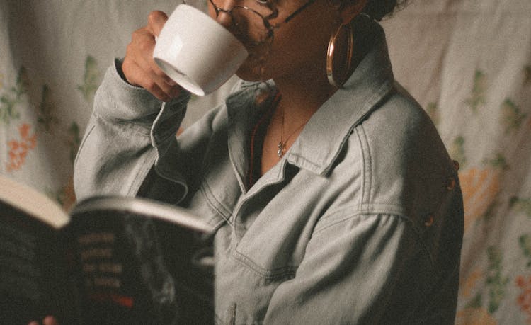 Woman Drinking Coffee In White Ceramic Mug