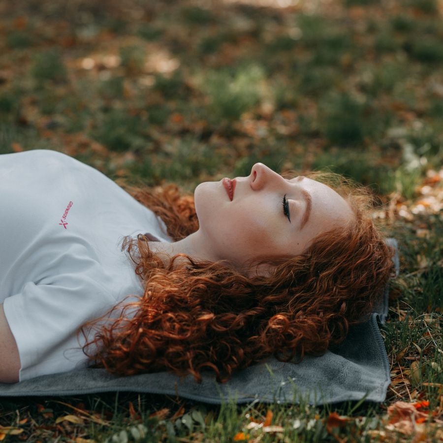 Woman sitting peacefully in morning light