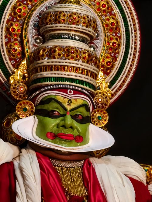 Free Close-up of a Kathakali performer in traditional costume and makeup, showcasing cultural artistry. Stock Photo
