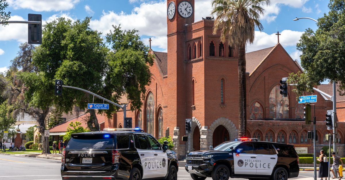 Redlands Police vehicles at a historic church intersection in Redlands, California.