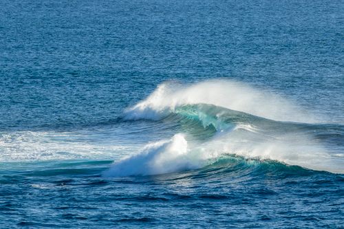 Free Captivating view of ocean waves crashing at Culburra Beach, New South Wales, Australia. Stock Photo