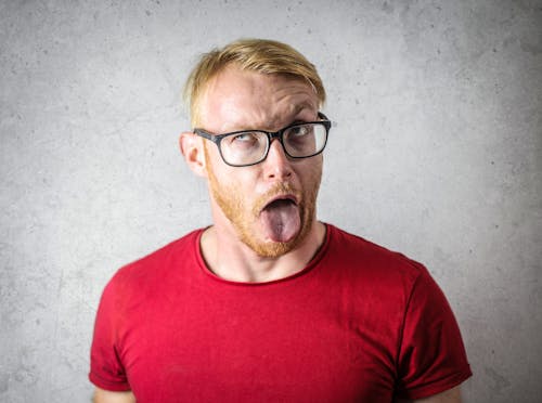 Photo Of Man Wearing Red Shirt