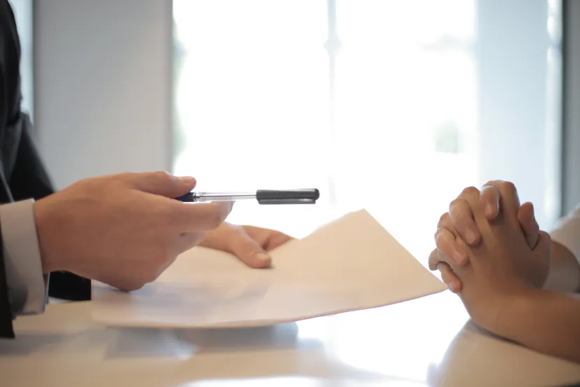 Project team reviewing documents with the client