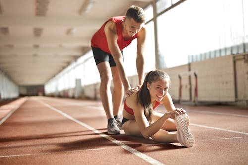 Free Man and Woman Doing Exercise Stock Photo