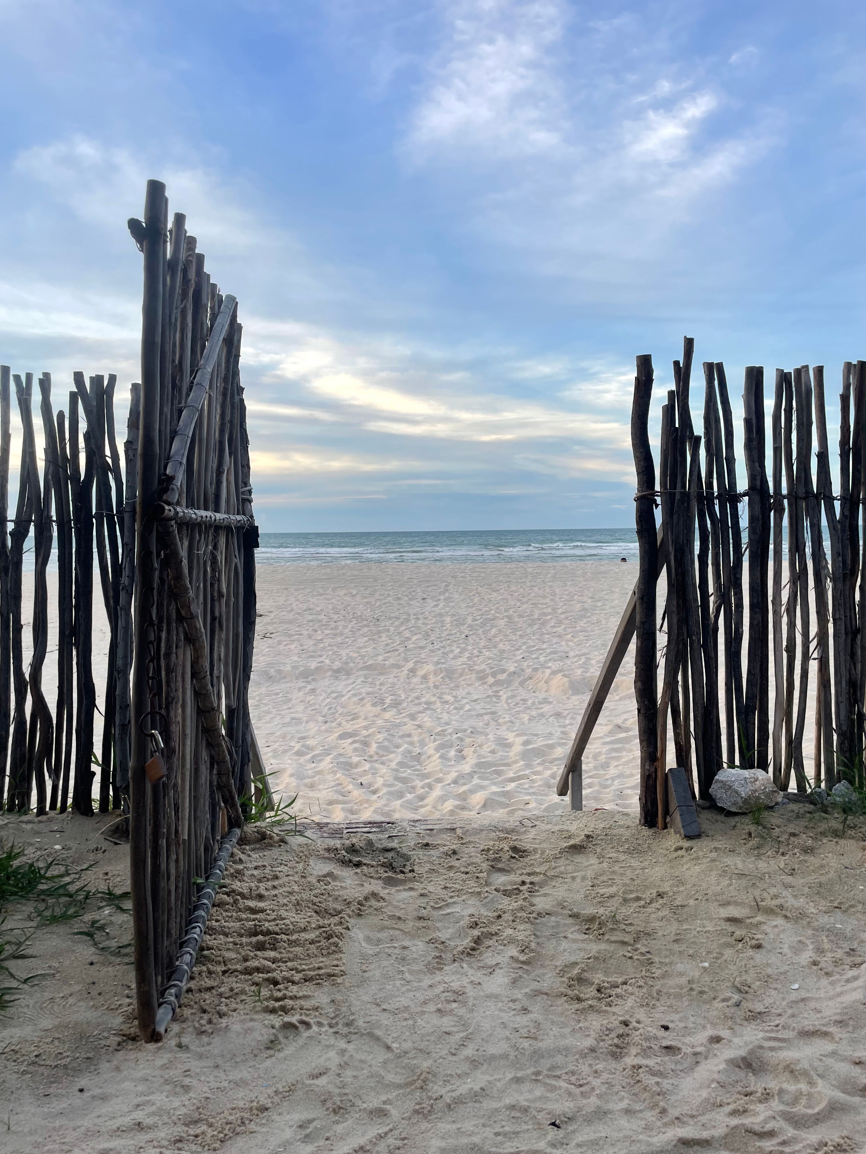 Rustic Gate Opening to Serene Beach View · Free Stock Photo