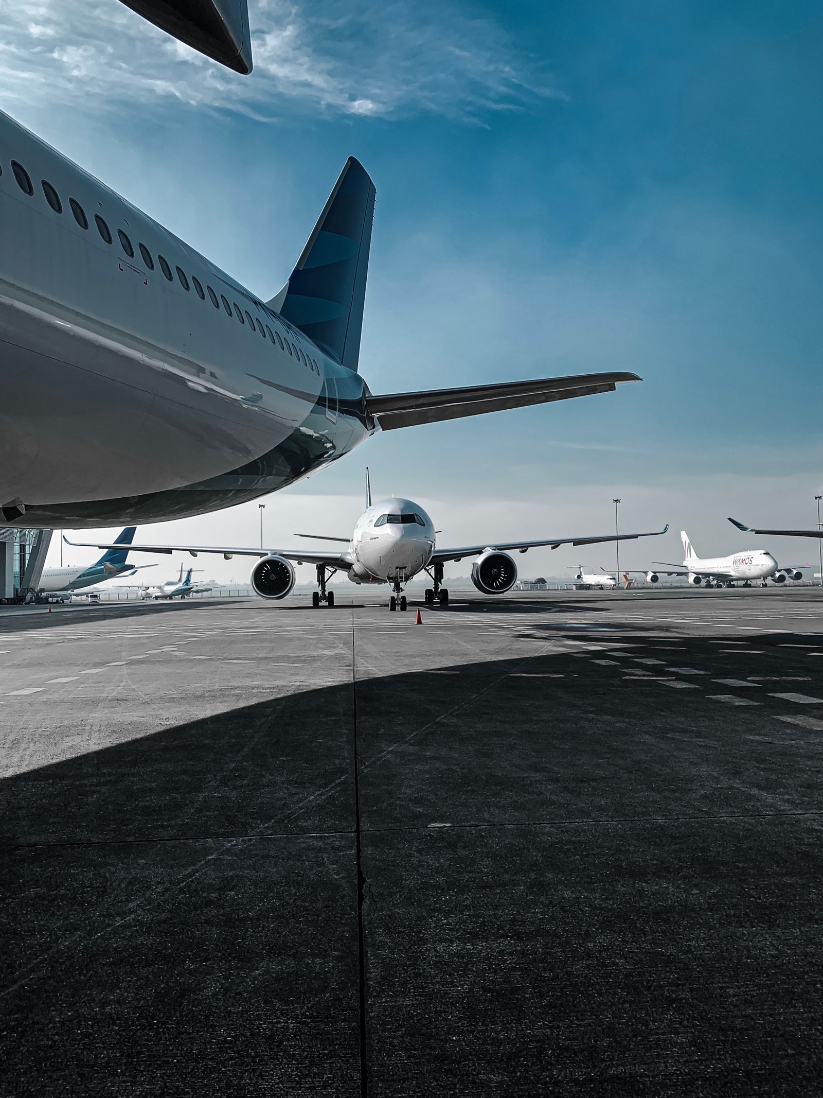 Low angle of aircraft parked on an airfield