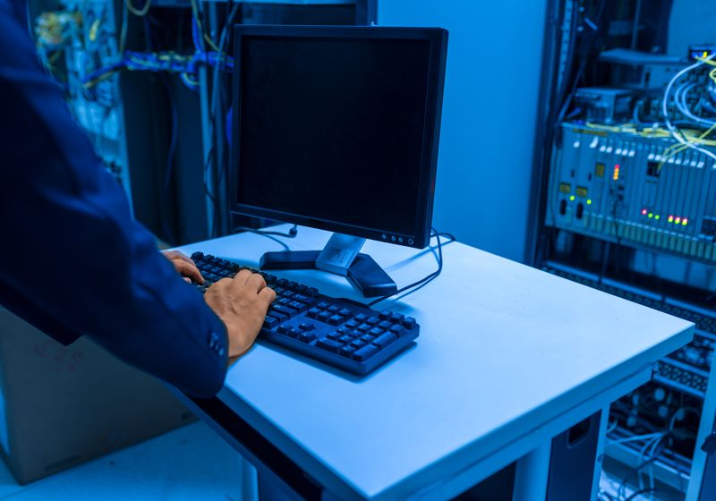 IT technician maintaining servers in a data centre