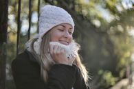 Photo of Woman Wearing White Beanie