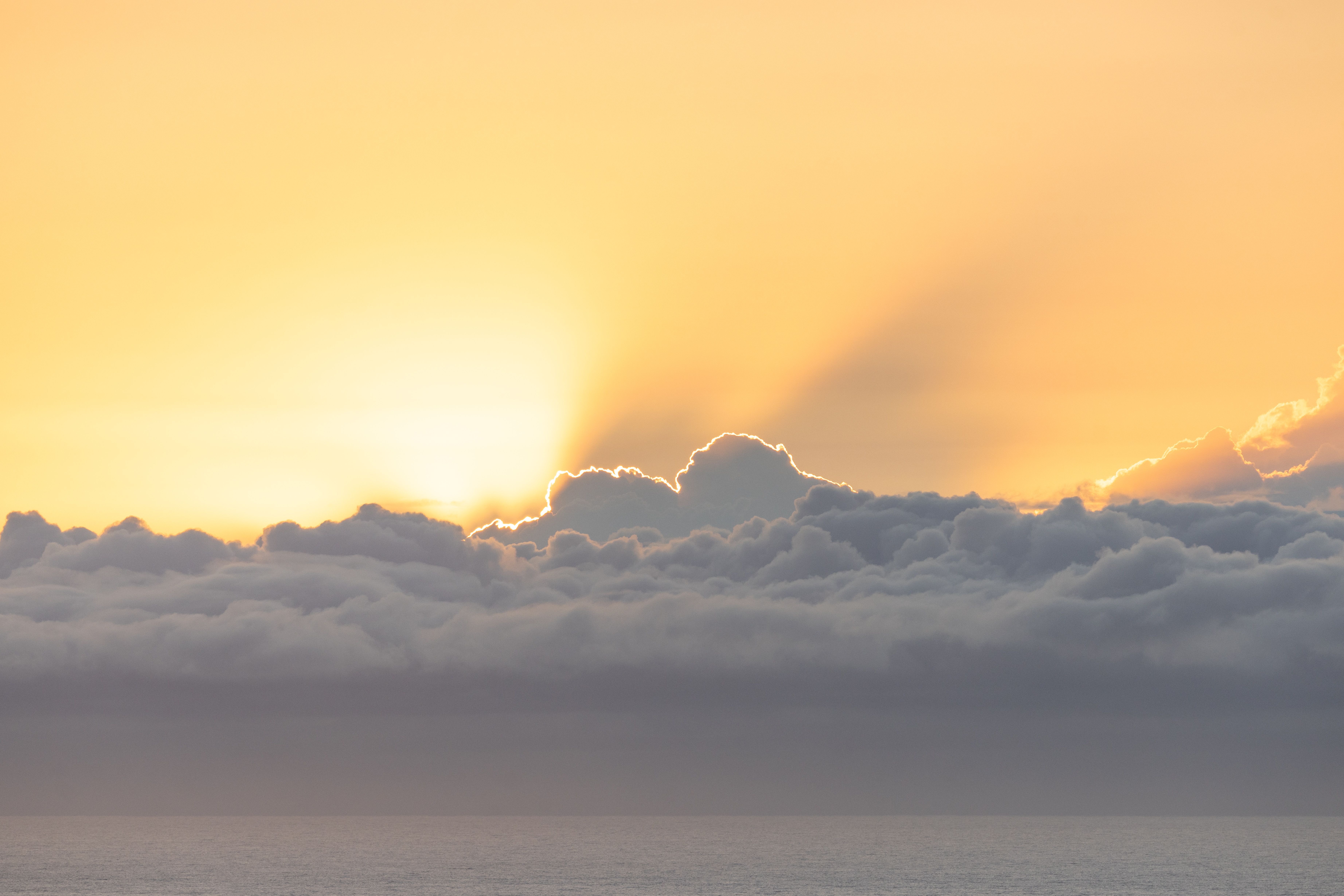 Beautiful Sunset Over Ocean with Clouds · Free Stock Photo