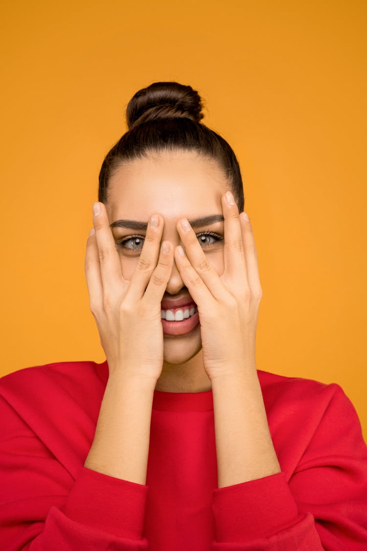 Photo Of Woman Covering Her Face