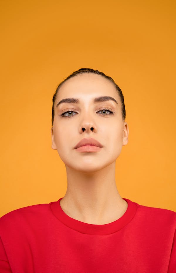  A woman with fuller lips standing confidently