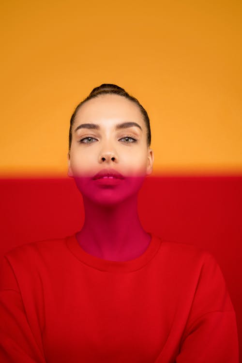 Photo of Woman In Red Sweater