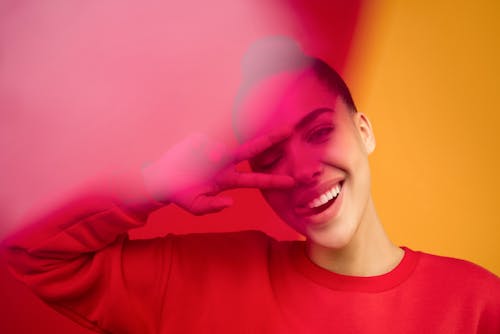 Photo of Woman In Red Sweater